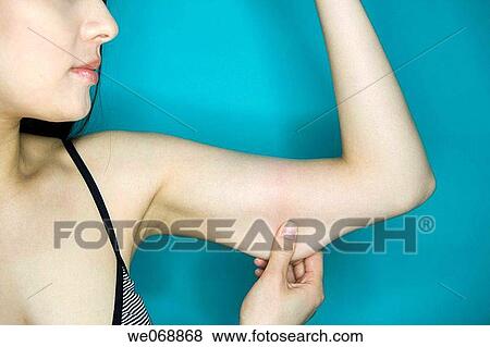 Stock Photo - Body care, detail, contemporary, arm. Fotosearch