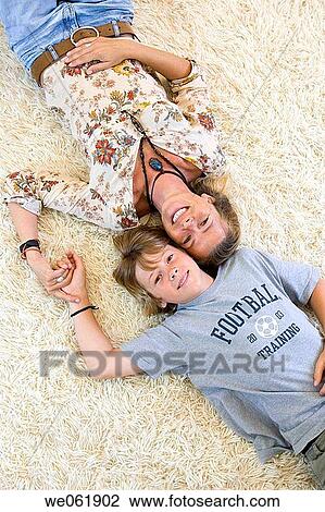 bond, carpet, boy, bonding, affection View Large Photo Image Stock Image - bond, carpet, boy, bonding, affection. Fotosearch