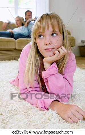Picture - bored, absent-mindedness, blond, at-home, absorbed, Absent-minded. Fotosearch