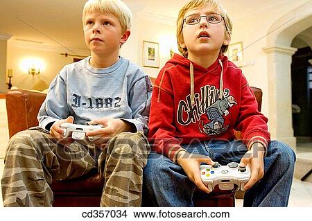 boy, addiction, blond, at-home, amusement, ability View Large Photo Image Picture - boy, addiction, blond, at-home, amusement, ability. Fotosearch