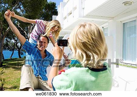 Stock Image - boy, brother, camera, child. Fotosearch