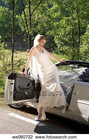 Stock Image - Bride in a convertible. Gipuzkoa, Euskadi.. Fotosearch