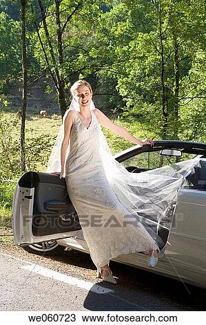 Bride in a convertible. Gipuzkoa, Euskadi. View Large Photo Image Stock Image - Bride in a convertible. Gipuzkoa, Euskadi.. Fotosearch