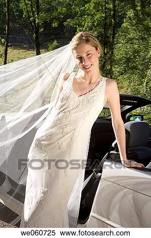 Bride in a convertible. Gipuzkoa, Euskadi. View Large Photo Image Stock Photography - Bride in a convertible. Gipuzkoa, Euskadi.. Fotosearch