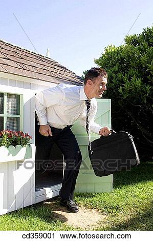 Stock Image - briefcase, business, businessman, businesspeople, carry. Fotosearch