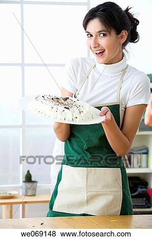 brunette, cake, apron View Large Photo Image Stock Photo - brunette, cake, apron. Fotosearch