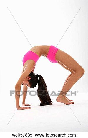 brunette, calisthenics, arch View Large Photo Image Stock Photography - brunette, calisthenics, arch. Fotosearch