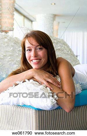 Stock Image - brunette, calm, carefree. Fotosearch
