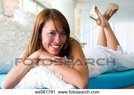 Stock Image - brunette, calm, carefree. Fotosearch