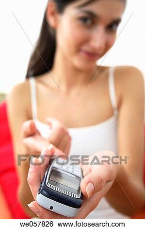 brunette, cell phone, communication View Large Photo Image Stock Photograph - brunette, cell phone, communication. Fotosearch