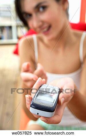 brunette, cell phone, communication View Large Photo Image Stock Photography - brunette, cell phone, communication. Fotosearch