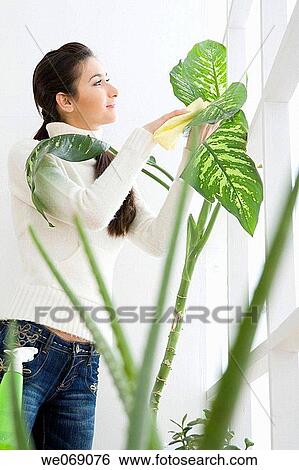 Stock Photograph - brunette, cloth, at-home. Fotosearch