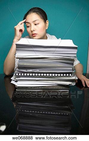 Stock Photo - business, busy, businesswoman, businesspeople, Asian. Fotosearch