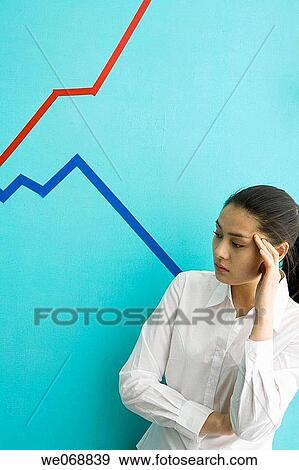 Stock Photo - business, chart, businesswoman, businesspeople, Asian. Fotosearch