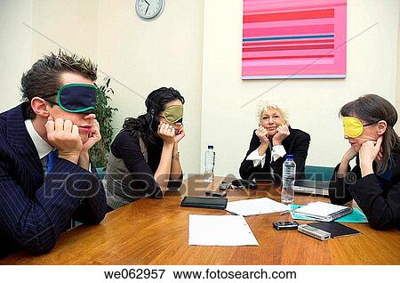 Business team in a boring meeting. View Large Photo Image Stock Photo - Business team in a boring meeting.. Fotosearch