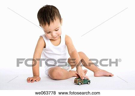 car, automobile, boy, black hair, baby, 3-4 years View Large Photo Image Stock Photo - car, automobile, boy, black hair, baby, 3-4 years. Fotosearch