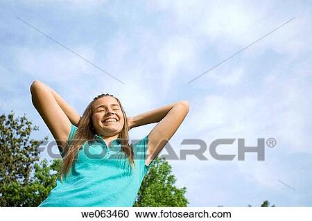 Stock Image - carefree, cloud, adolescence. Fotosearch
