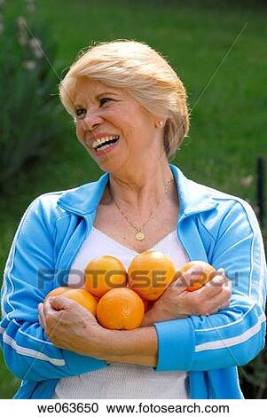 Citrus fruit, day, Facial expression, Female View Large Photo Image Stock Image - Citrus fruit, day, Facial expression, Female. Fotosearch