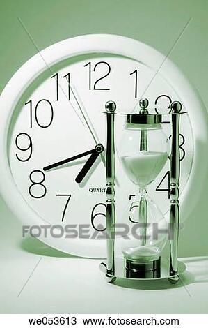 Clock and hourglass View Large Photo Image Stock Image - Clock and hourglass. Fotosearch