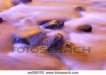 Colours of autumn trees are reflecting in brook. Roseg valley, Engadine, Grisons, Switzerland, Europe. View Large Photo Image Stock Image - Colours of autumn trees are reflecting in brook. Roseg valley, Engadine, Grisons, Switzerland, Europe.. Fotosearch