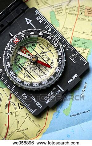 Compass on a map View Large Photo Image Stock Photograph - Compass on a map. Fotosearch