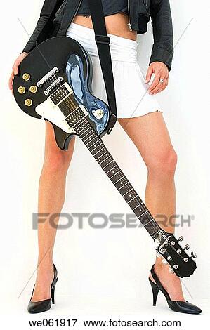 contemporary, Electric guitar, Female, feminine View Large Photo Image Stock Photo - contemporary, Electric guitar, Female, feminine. Fotosearch