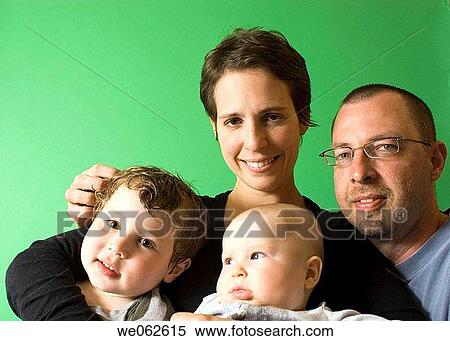 Family with mother, father, toddler, baby View Large Photo Image Stock Photography - Family with mother, father, toddler, baby. Fotosearch