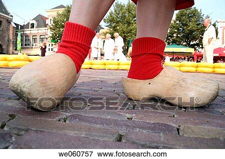 Farmhand in wood shoes at cheese market, Kaasmarkt, Alkmaar, Holland, Netherlands View Large Photo Image Stock Photo - Farmhand in wood shoes at cheese market, Kaasmarkt, Alkmaar, Holland, Netherlands. Fotosearch