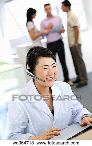 Fatronik Research Centre, San Sebastian Technological Park, Donostia, Gipuzkoa, Basque Country. Operator at the office View Large Photo Image Stock Photo - Fatronik Research Centre, San Sebastian Technological Park, Donostia, Gipuzkoa, Basque Country. Operator at the office. Fotosearch