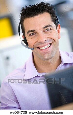 Stock Photography - Fatronik Research Centre, San Sebastian Technological Park, Donostia, Gipuzkoa, Basque Country. Operator at the office. Fotosearch