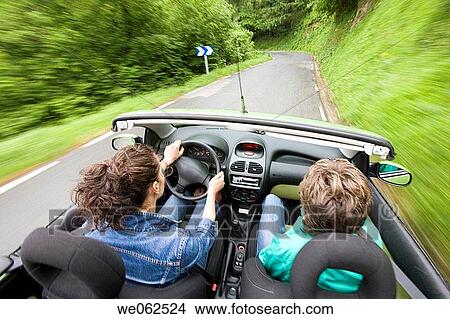 Picture - Friends in convertible car, Gipuzkoa, Euskadi. Spain.. Fotosearch