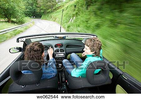Picture - Friends in convertible car, Gipuzkoa, Euskadi. Spain.. Fotosearch