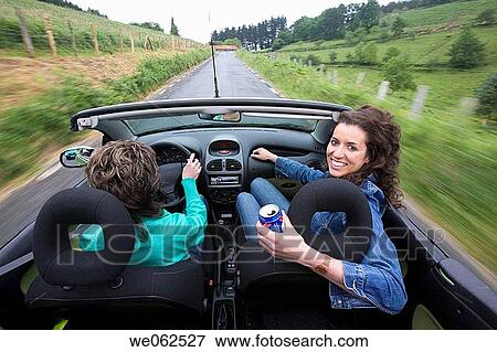 Friends in convertible car, Gipuzkoa, Euskadi. Spain. View Large Photo Image Stock Photo - Friends in convertible car, Gipuzkoa, Euskadi. Spain.. Fotosearch