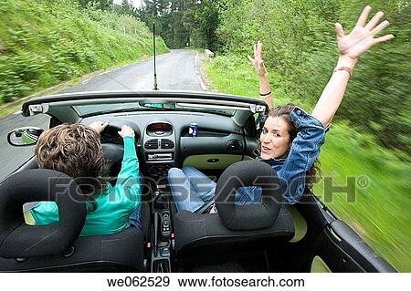 Friends in convertible car, Gipuzkoa, Euskadi. Spain. View Large Photo Image Stock Photo - Friends in convertible car, Gipuzkoa, Euskadi. Spain.. Fotosearch