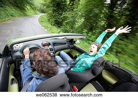 Friends in convertible car, Gipuzkoa, Euskadi. Spain. View Large Photo Image Stock Photo - Friends in convertible car, Gipuzkoa, Euskadi. Spain.. Fotosearch