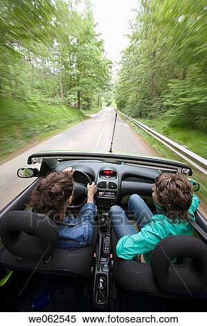 Friends in convertible car, Gipuzkoa, Euskadi. Spain. View Large Photo Image Stock Photography - Friends in convertible car, Gipuzkoa, Euskadi. Spain.. Fotosearch