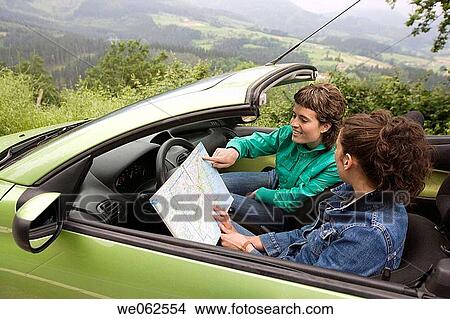 Friends in convertible car. Mirador de Udana, O±ate. Gipuzkoa, Euskadi. Spain. View Large Photo Image Picture - Friends in convertible car. Mirador de Udana, O±ate. Gipuzkoa, Euskadi. Spain.. Fotosearch