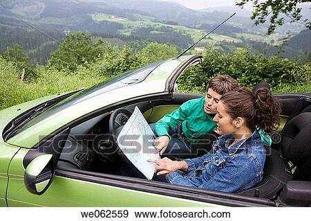 Stock Photo - Friends in convertible car. Mirador de Udana, O±ate. Gipuzkoa, Euskadi. Spain.. Fotosearch