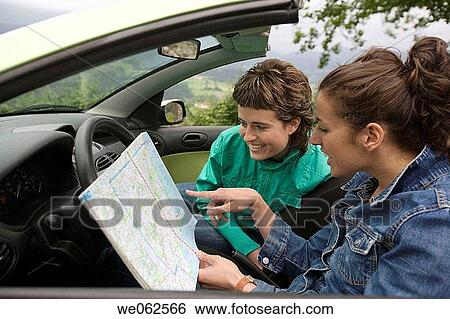 Friends in convertible car. Mirador de Udana, O±ate. Gipuzkoa, Euskadi. Spain. View Large Photo Image Stock Photograph - Friends in convertible car. Mirador de Udana, O±ate. Gipuzkoa, Euskadi. Spain.. Fotosearch