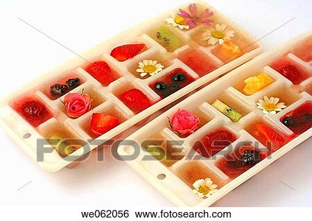 Fruits and flowers ice cubes View Large Photo Image Stock Photograph - Fruits and flowers ice cubes. Fotosearch