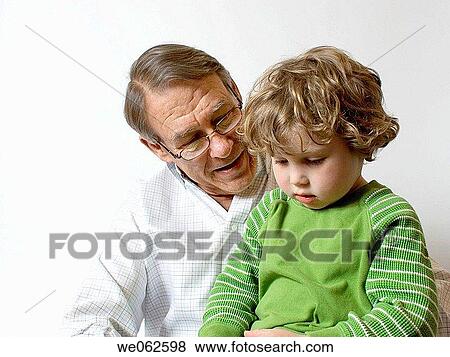 Grandfather and three-year-old boy View Large Photo Image Stock Photo - Grandfather and three-year-old boy. Fotosearch