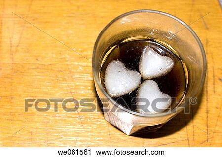 Heart-shaped ice cubes View Large Photo Image Stock Image - Heart-shaped ice cubes. Fotosearch