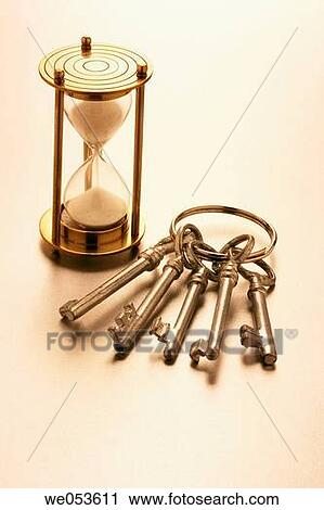 Hourglass and skeleton keys View Large Photo Image Stock Image - Hourglass and skeleton keys. Fotosearch