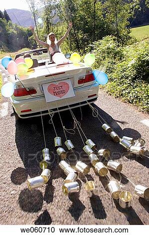 Stock Image - Just Married. Convertible car with tin cans. Gipuzkoa, Euskadi.. Fotosearch