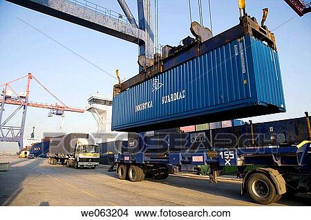 Loading cargo containers in ship, Port of Bilbao, Santurtzi. Biscay, Euskadi, Spain View Large Photo Image Picture - Loading cargo containers in ship, Port of Bilbao, Santurtzi. Biscay, Euskadi, Spain. Fotosearch