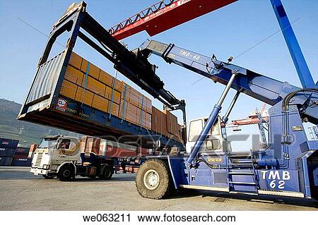 Loading cargo containers in ship, Port of Bilbao, Santurtzi. Biscay, Euskadi, Spain View Large Photo Image Stock Image - Loading cargo containers in ship, Port of Bilbao, Santurtzi. Biscay, Euskadi, Spain. Fotosearch