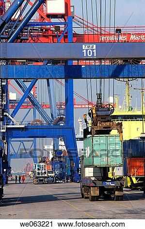 Loading cargo containers in ship, Port of Bilbao, Santurtzi. Biscay, Euskadi, Spain View Large Photo Image Stock Image - Loading cargo containers in ship, Port of Bilbao, Santurtzi. Biscay, Euskadi, Spain. Fotosearch