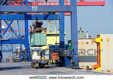 Loading cargo containers in ship, Port of Bilbao, Santurtzi. Biscay, Euskadi, Spain View Large Photo Image Stock Image - Loading cargo containers in ship, Port of Bilbao, Santurtzi. Biscay, Euskadi, Spain. Fotosearch
