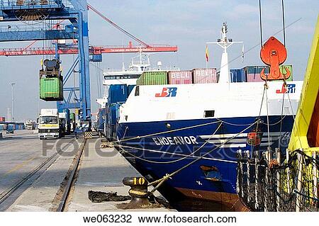 Loading cargo containers in ship, Port of Bilbao, Santurtzi. Biscay, Euskadi, Spain View Large Photo Image Stock Image - Loading cargo containers in ship, Port of Bilbao, Santurtzi. Biscay, Euskadi, Spain. Fotosearch
