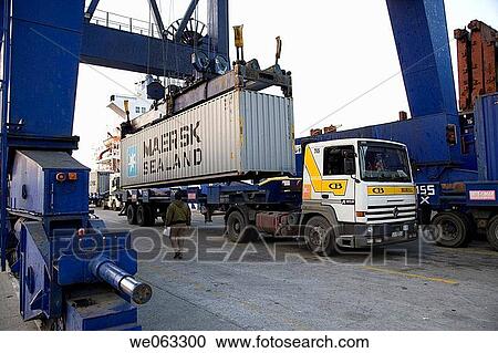 Loading cargo containers in ship, Port of Bilbao, Santurtzi. Biscay, Euskadi, Spain View Large Photo Image Stock Image - Loading cargo containers in ship, Port of Bilbao, Santurtzi. Biscay, Euskadi, Spain. Fotosearch
